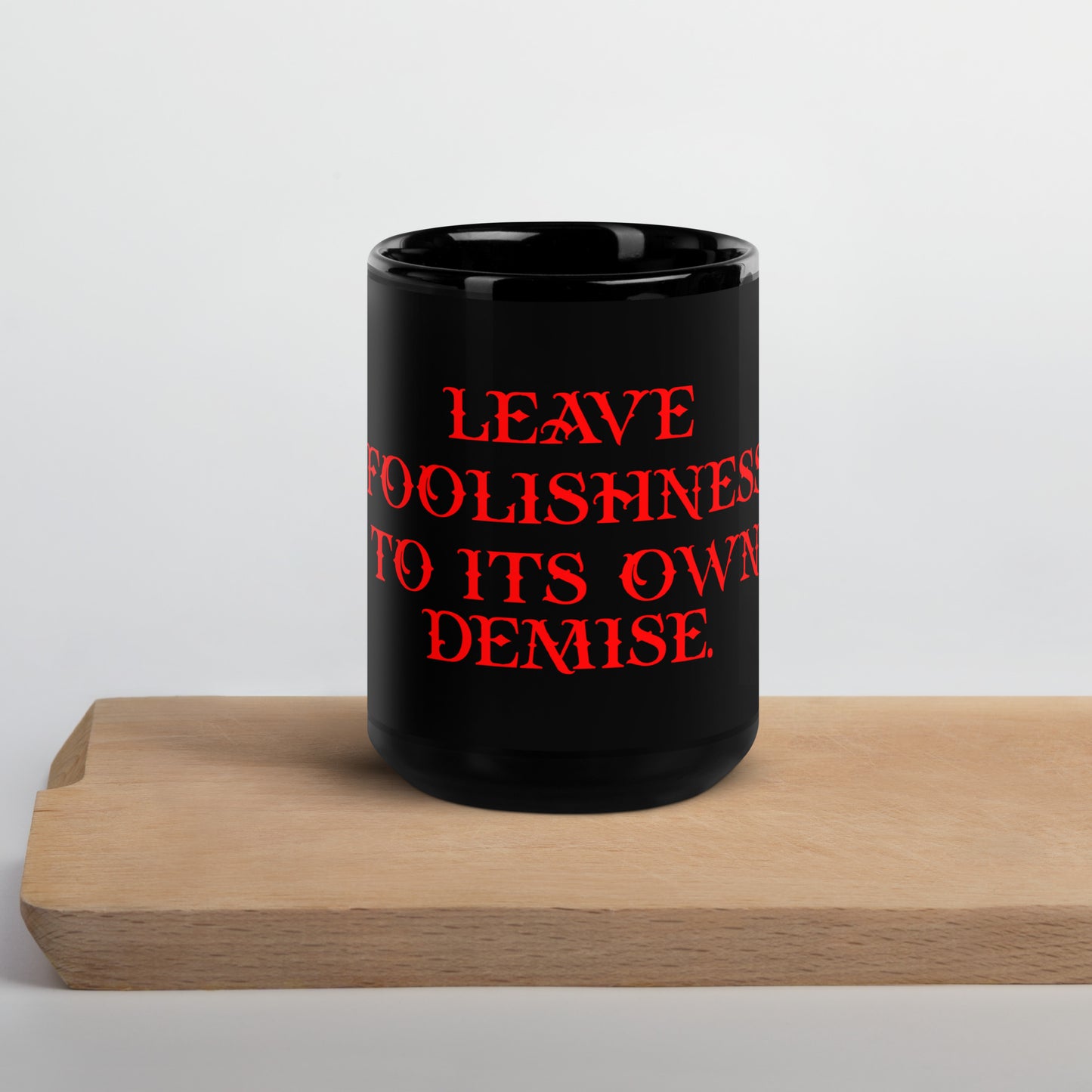 Foolishness Black Glossy Mug