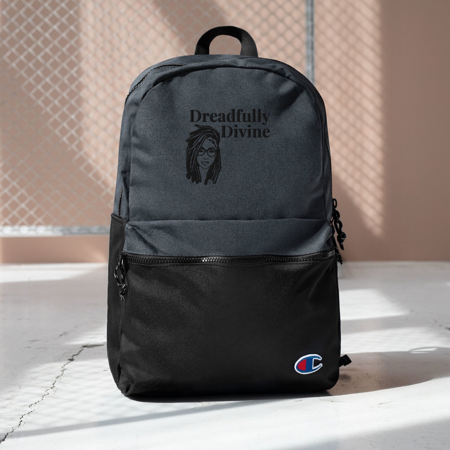 DD Woman (Black) Embroidered Champion Backpack